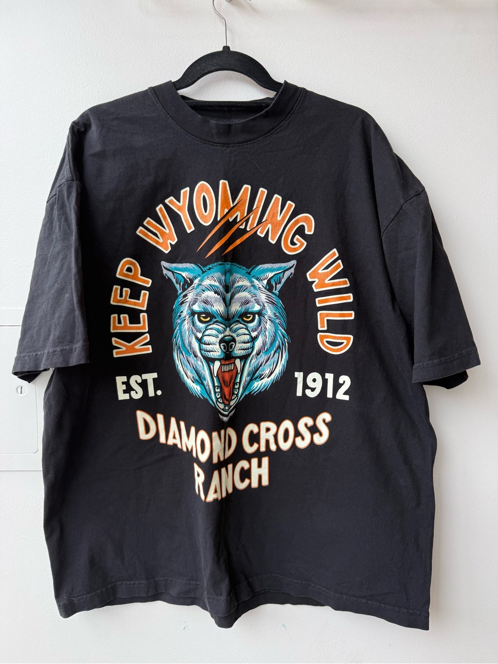 SOLD OUT Keep Wyoming Wild Wolf Graphic Tee - Black with Teal & Orange